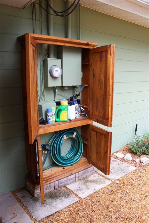 hiding electrical box outside|how to hide water boxes.